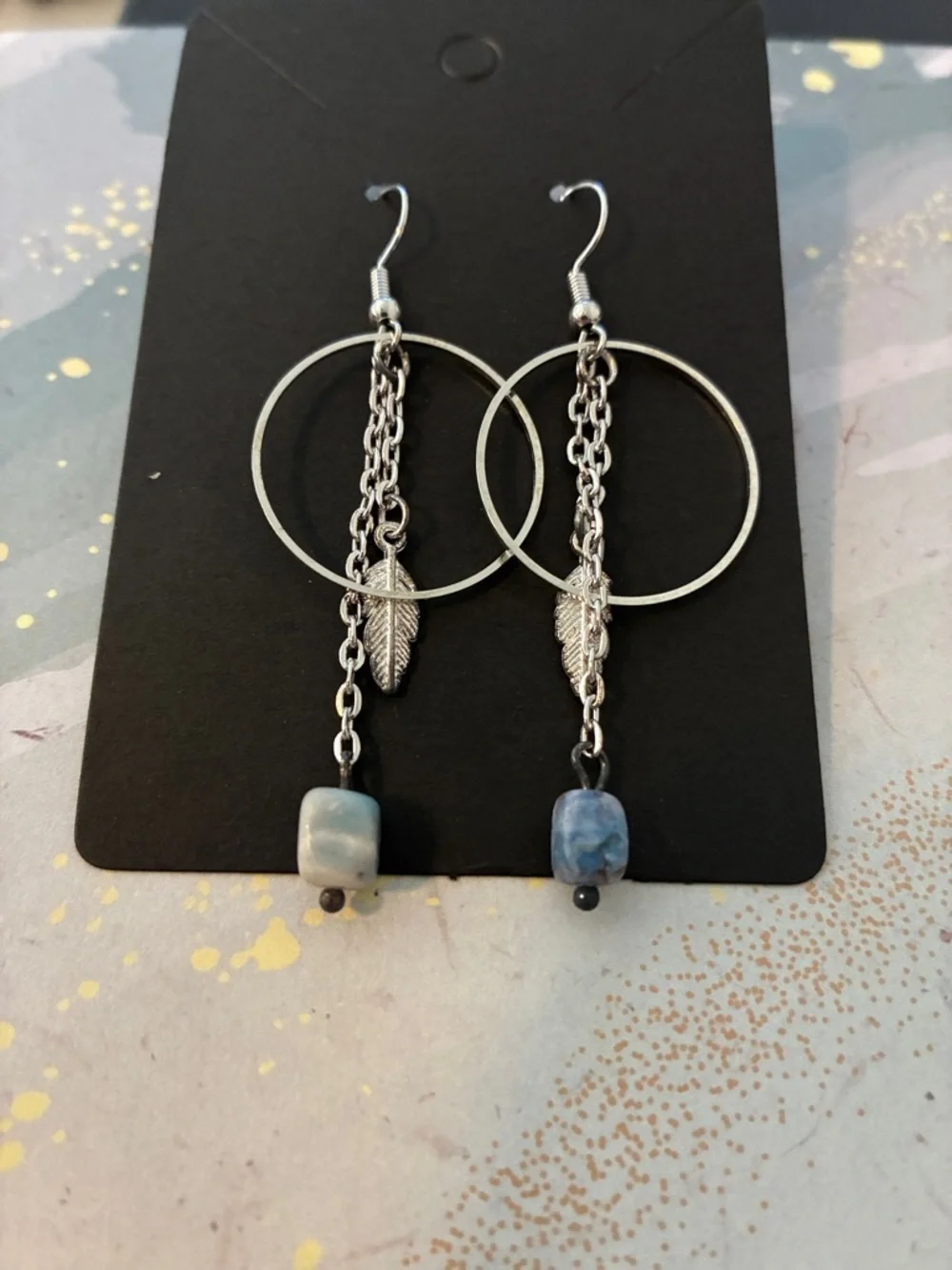 Silver Hoop Dangle Earrings with Blue Stone and Feather Charm